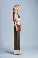 Crepe double-face trousers with contrast detailing and crystal embellishment tracing the front stitching. Featuring a refined tailored silhouette, these statement trousers are designed for evening outfits, parties, celebrations and sophisticated winter dressing.