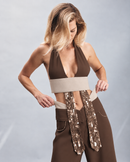 Crepe double-face top featuring contrast detailing at the waist, an appliqué tie detail and all-over crystal embellishment. A sophisticated statement top designed for eveningwear, celebrations, parties and elevated winter occasions.
