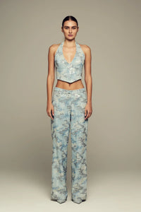 Hand-embroidered, halter neck blue denim top