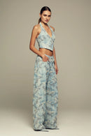 Hand-embroidered, halter neck blue denim top
