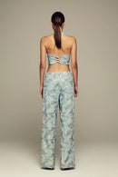 Hand-embroidered, halter neck blue denim top