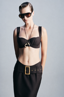 Chocolate brown bra crafted from luxurious 100% wool with delicate hook detailing and a refined structured finish. Designed as a statement layering piece for evening styling, sophisticated outfits, special occasions and elevated winter dressing.